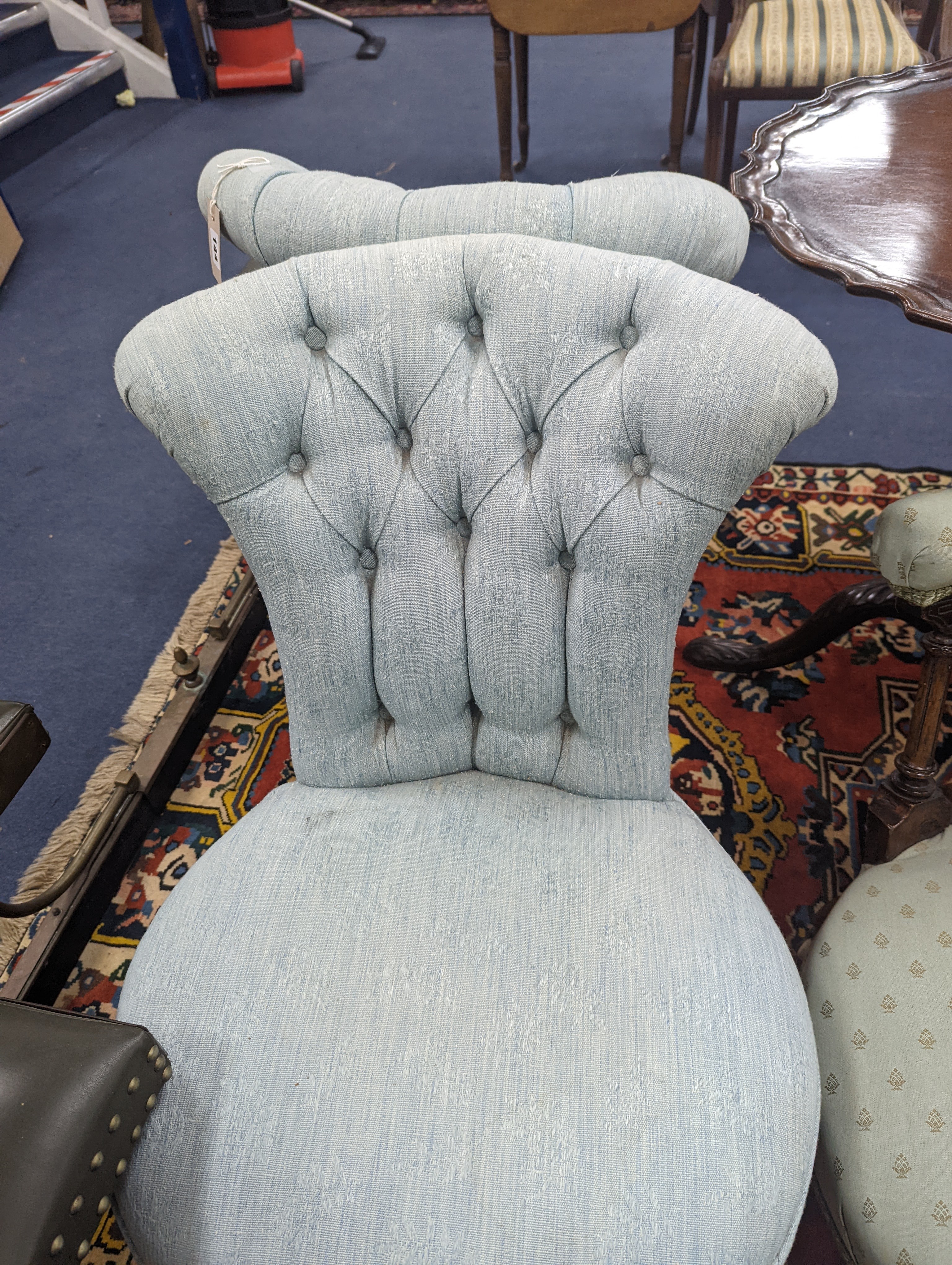 A pair of late 19th century French upholstered side chairs